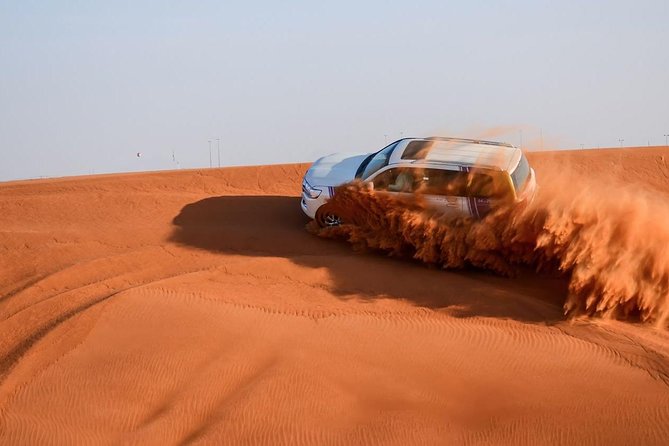 Sharjah: Desert Sandboarding, Lunch, Camel Ride, Belly Dancing  - Dubai - Take a Thrilling Camel Ride or Try Sandboarding on the Dunes