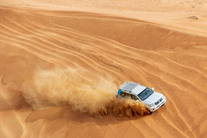 Dubai Desert 4x4 Dune Bashing, Sandboarding, Camel Riding, Dinner - Immerse Yourself in a Captivating Cultural Show